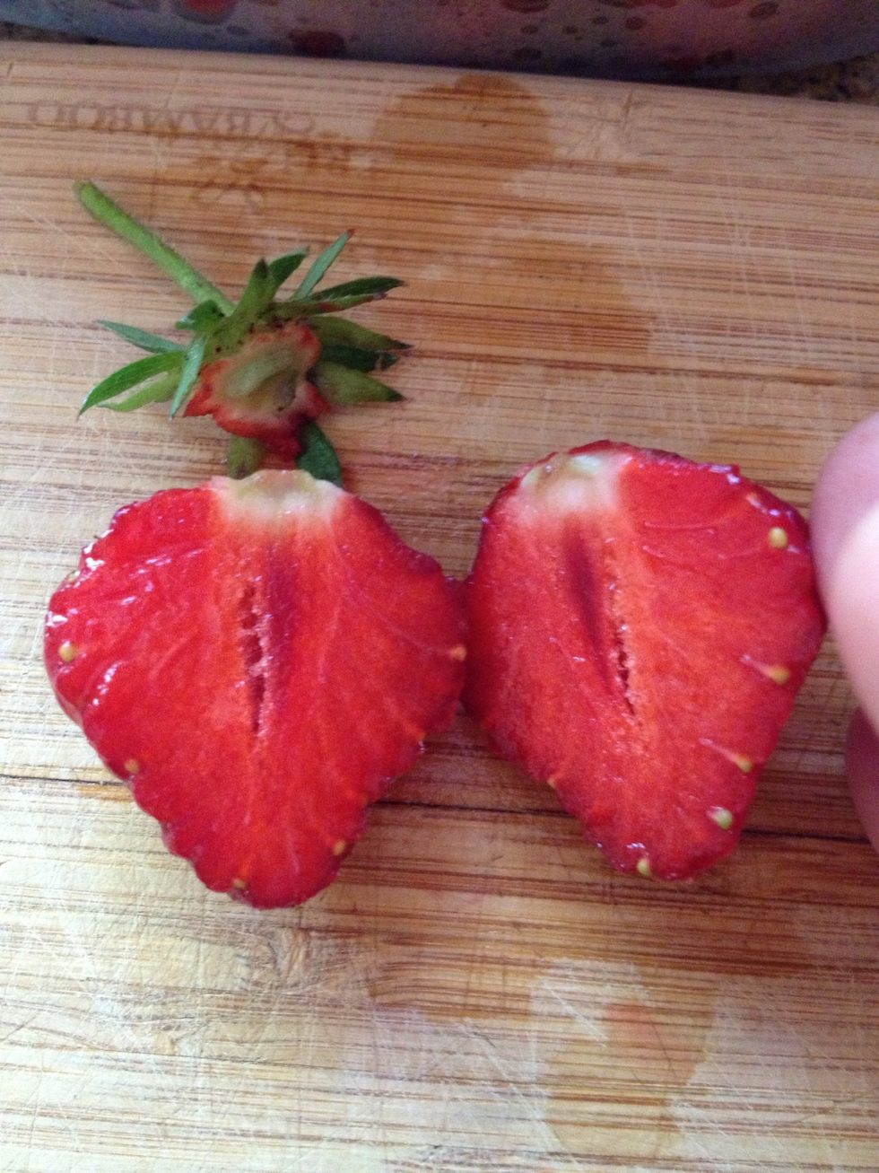 Cut in half...ooh that's definitely a really ripe red-all-the-way-through strawberry!!!