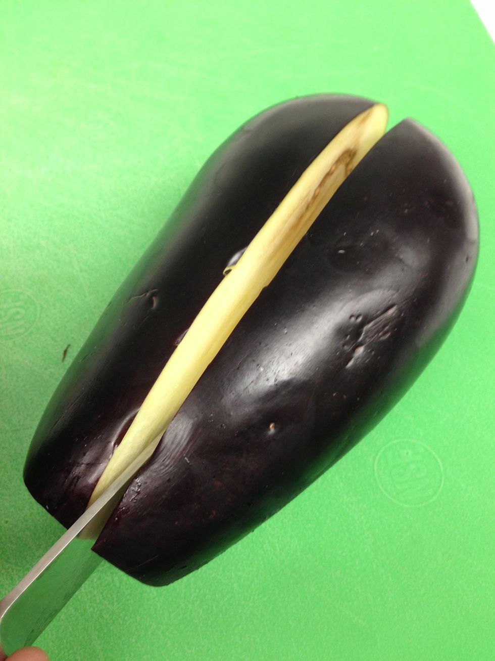 Cut in half the long way.