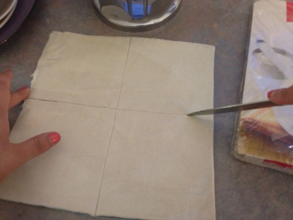 Cut in half the other way around, making 4 equal squares