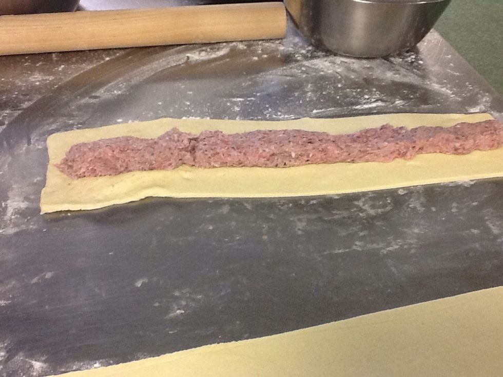 Cut in half then fill with half your sausage meat