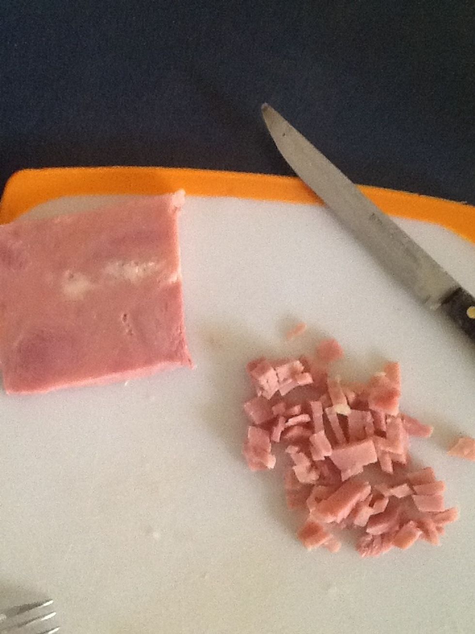 Cut in Small pieces Jam and add it to the potatoes.