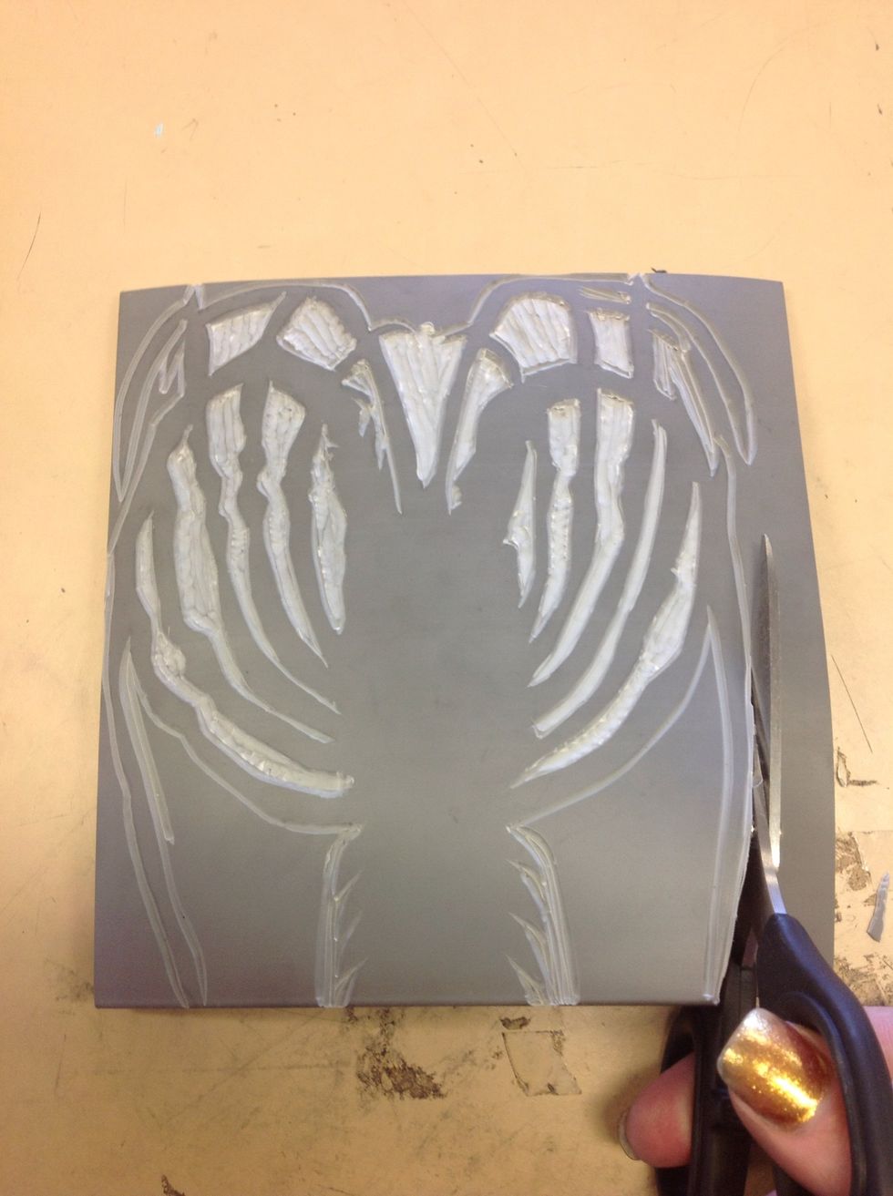 Cut inside the lines you have carved around the object.