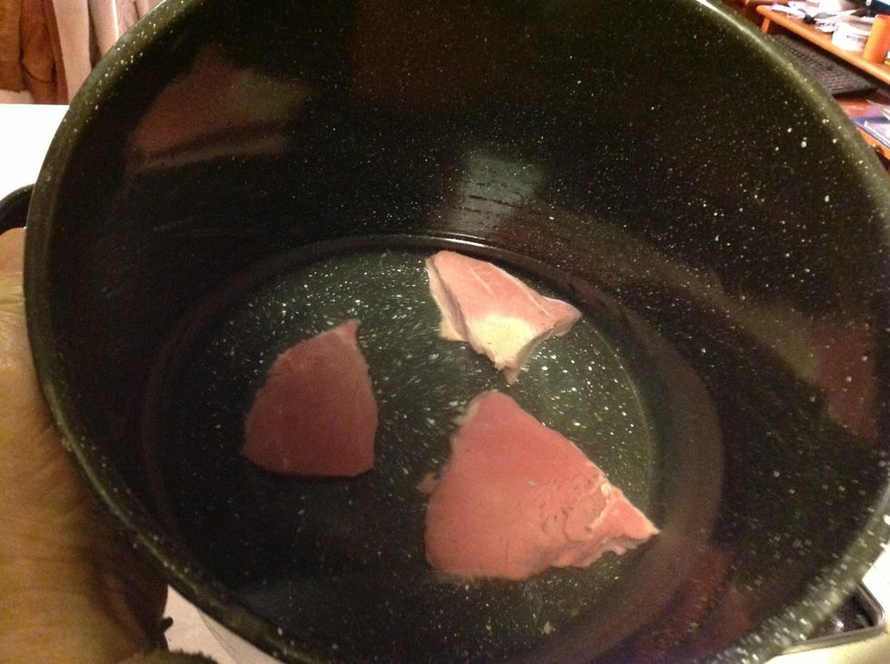 Cut into about 3x3 inch pieces and add to pot