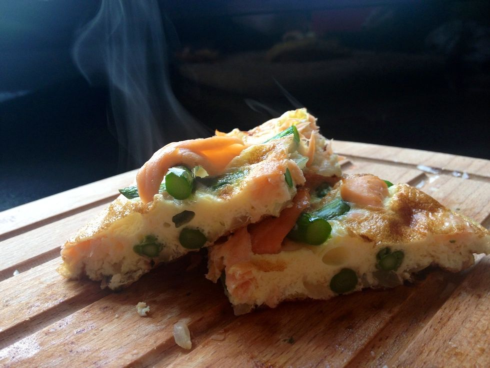 Cut into quarters and serve. Tastes lovely either hot or cold and can be eaten on its own for breakfast, or served with salad and coleslaw for lunch or dinner.