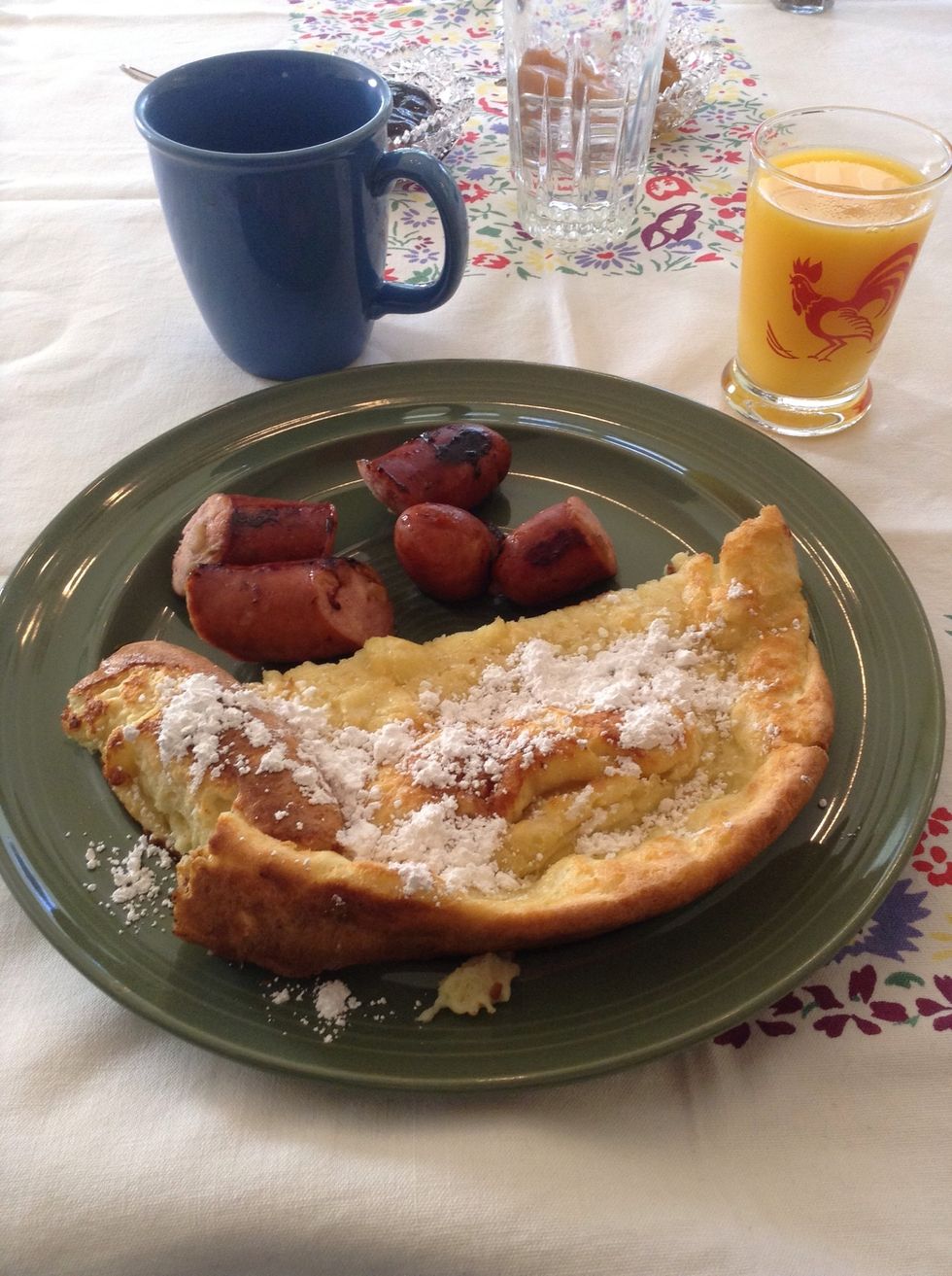 Cut into wedges & serve. It's surprisingly light yet packed with flavor! You can also top with berries or other fruit if you want. Thanks Christine, for this delicious breakfast! Dutch Baby, baby!