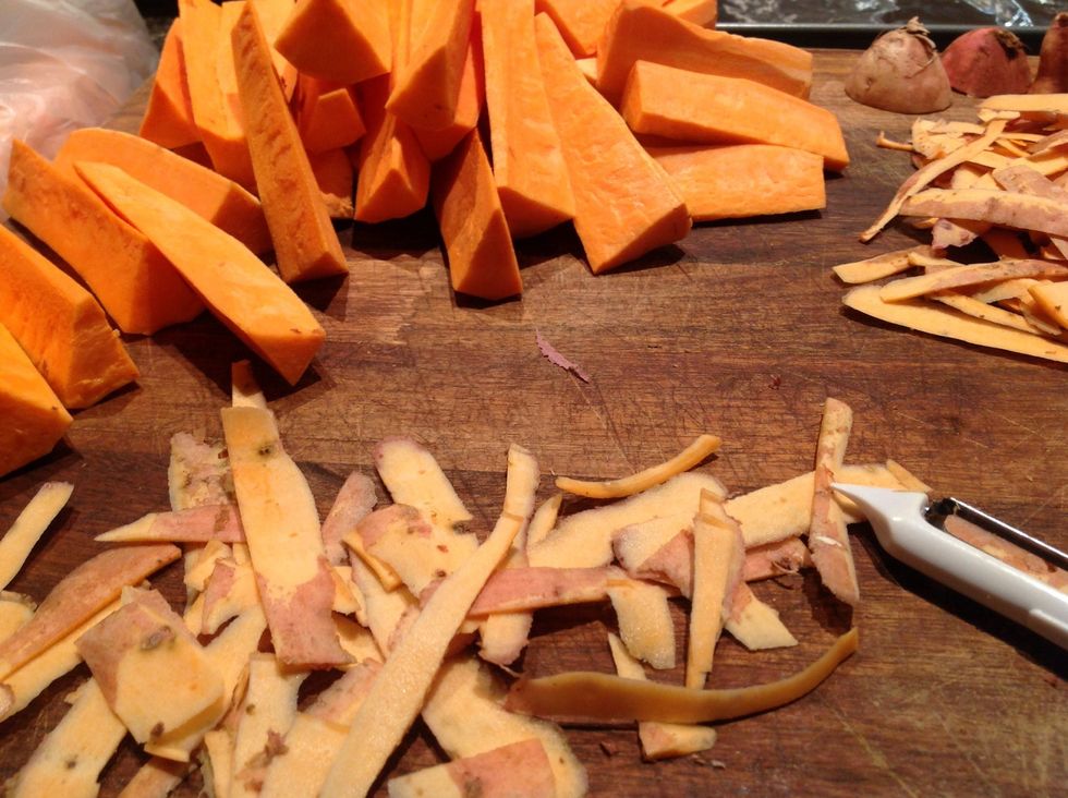 Cut into wedges then peel the skin of each wedge (alternatively you can peel the sweet potato at the beginning and then cut into wedges)