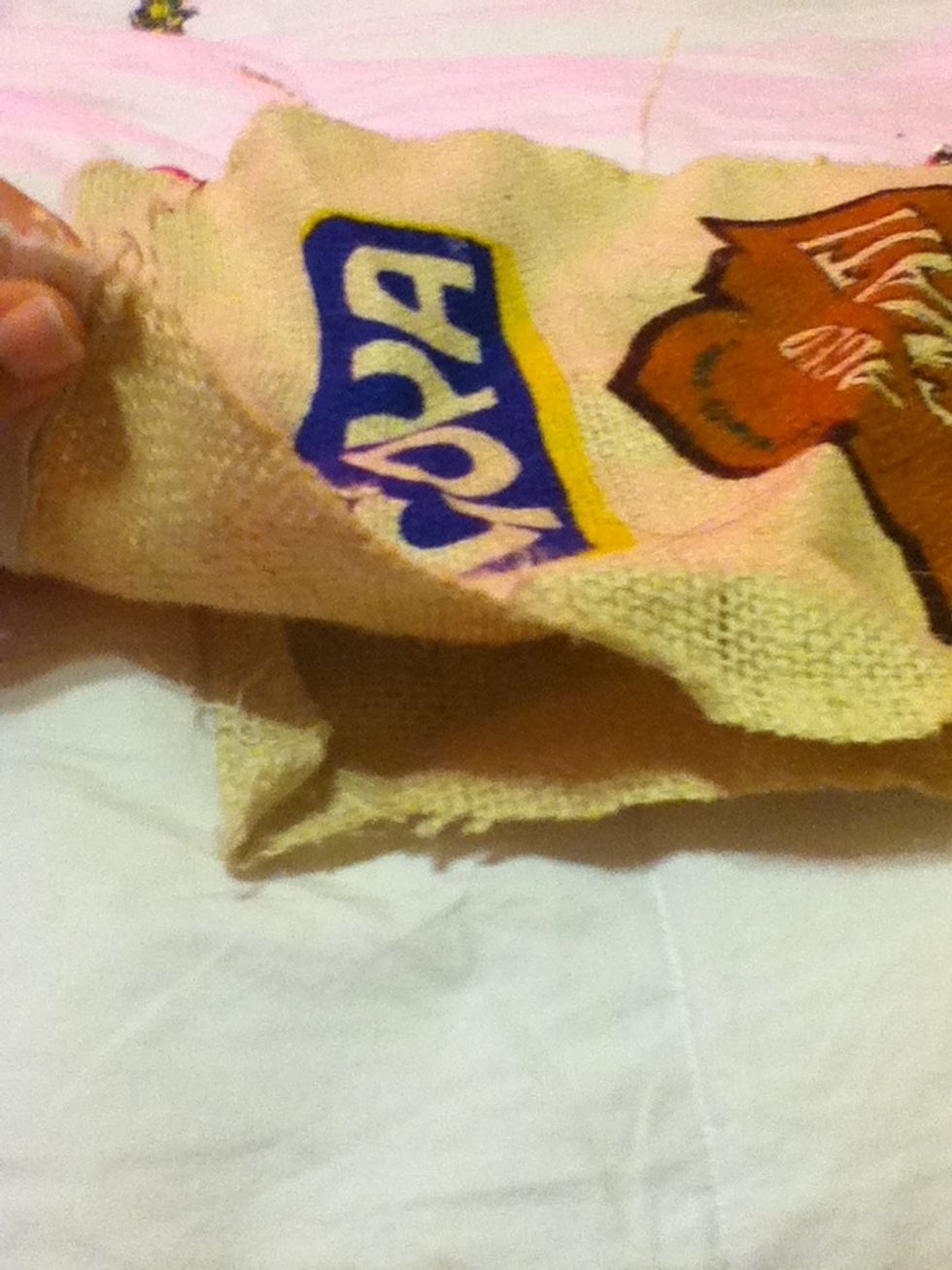 Cut it along the edges on both sides and the top as well so it will open