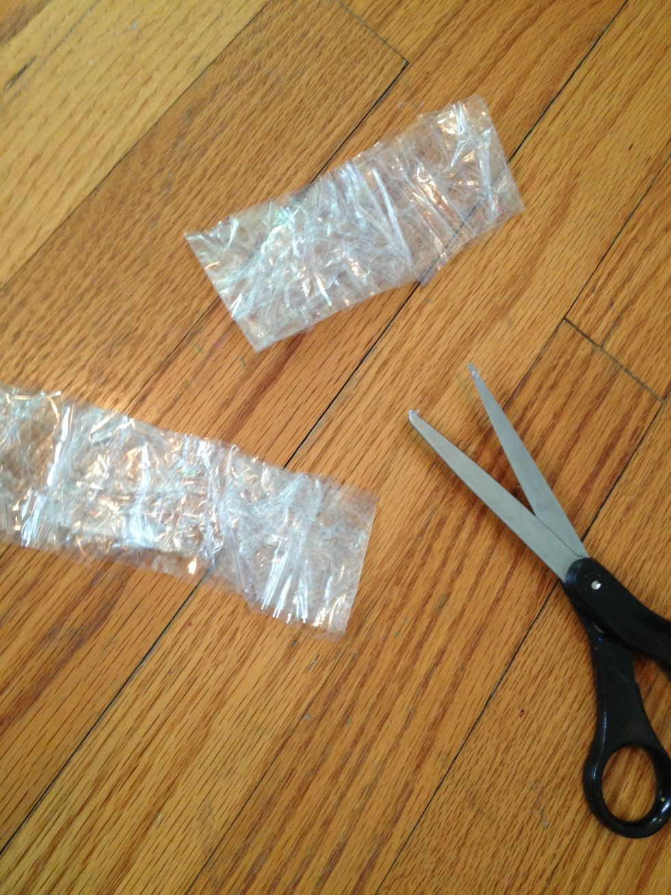 Cut it in half, and put a final layer of tape over each half to smooth it out.