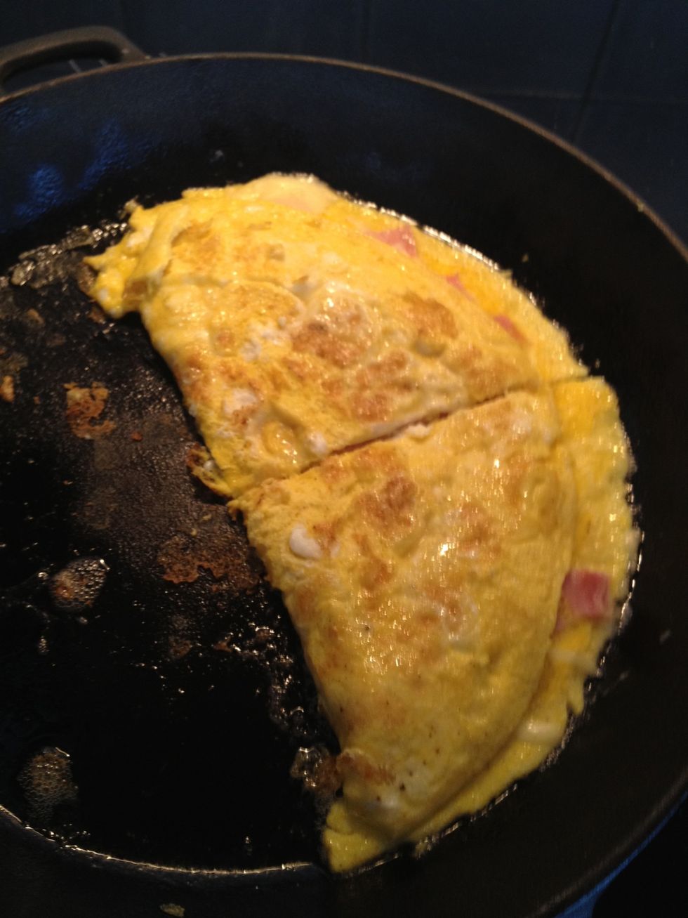 Cut it in two, that way it is easier to scoop it out of the pan
