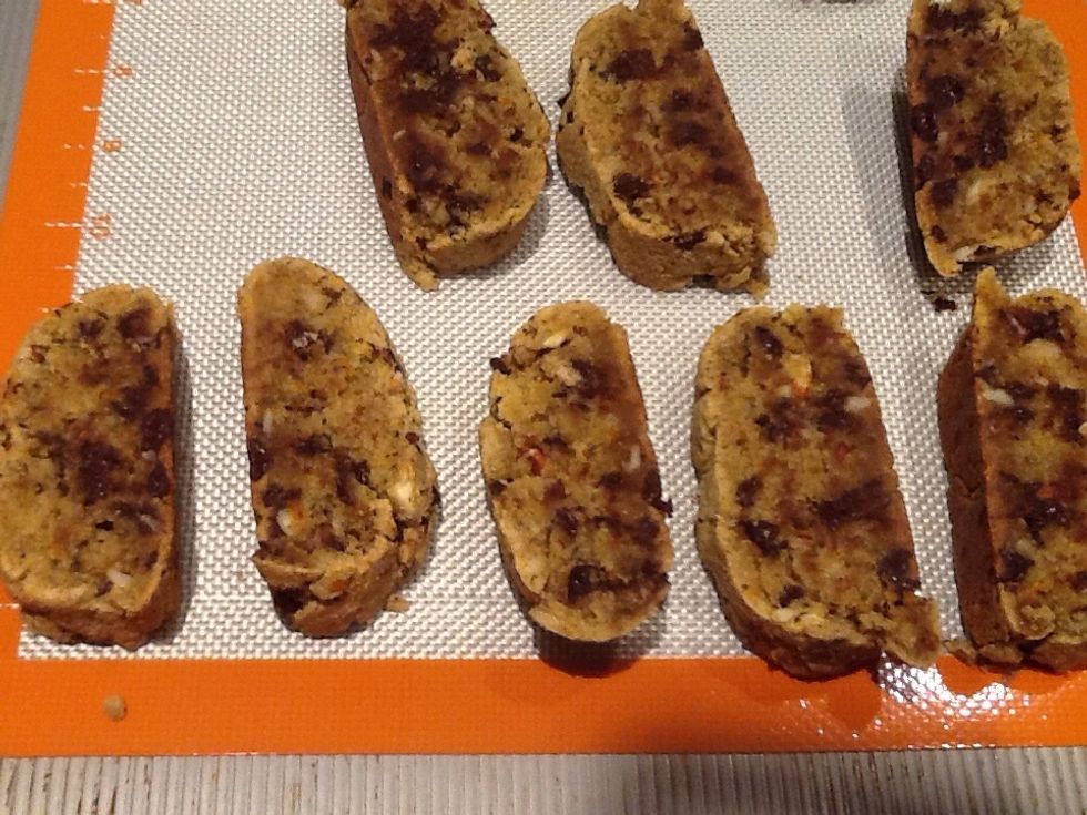 Cut it into eight or more slices. Pre heat oven to 250\u00b0. When cooled, slice and bake 10 minutes, turn over the slices and bake 10 minutes, TURN OFF THE OVEN. Let them cool and dry in the oven.