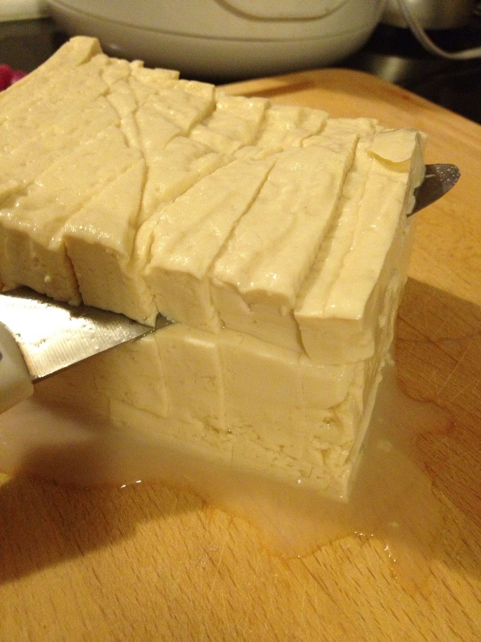 Cut it into small little cube, drain the water from tofu and set aside.
