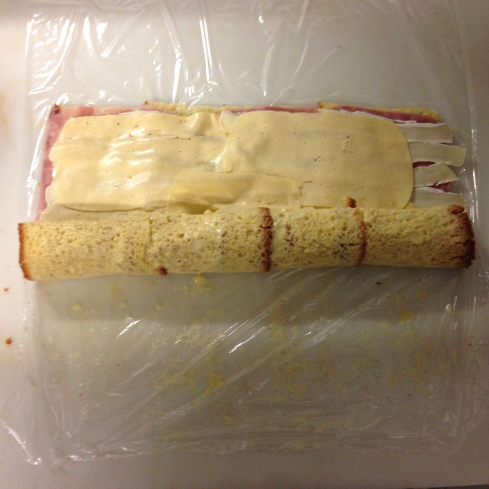 Cut it on a half and roll it up