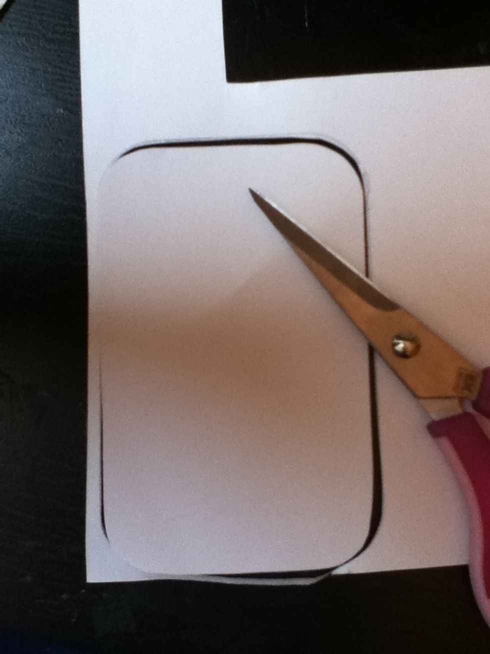 Cut it out, again staying slightly inside your traced lines.