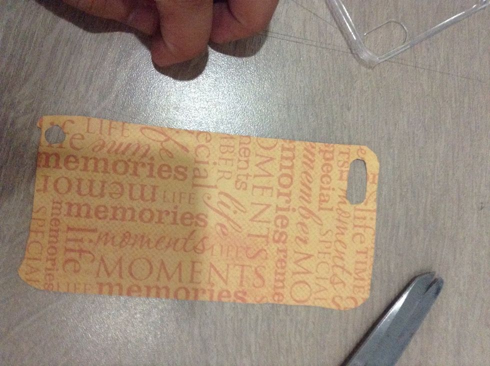 Cut it out. Don't forget the holes for the camera.