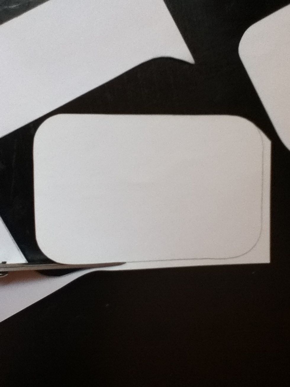 Cut it out. If possible, try to cut slightly inside the lines.