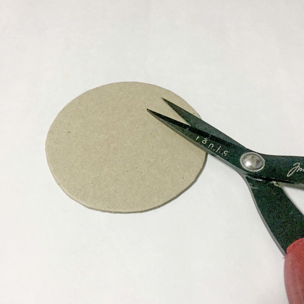 Cut it out using a heavy duty scissors.