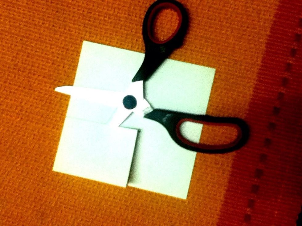 Cut it out using a scissor..