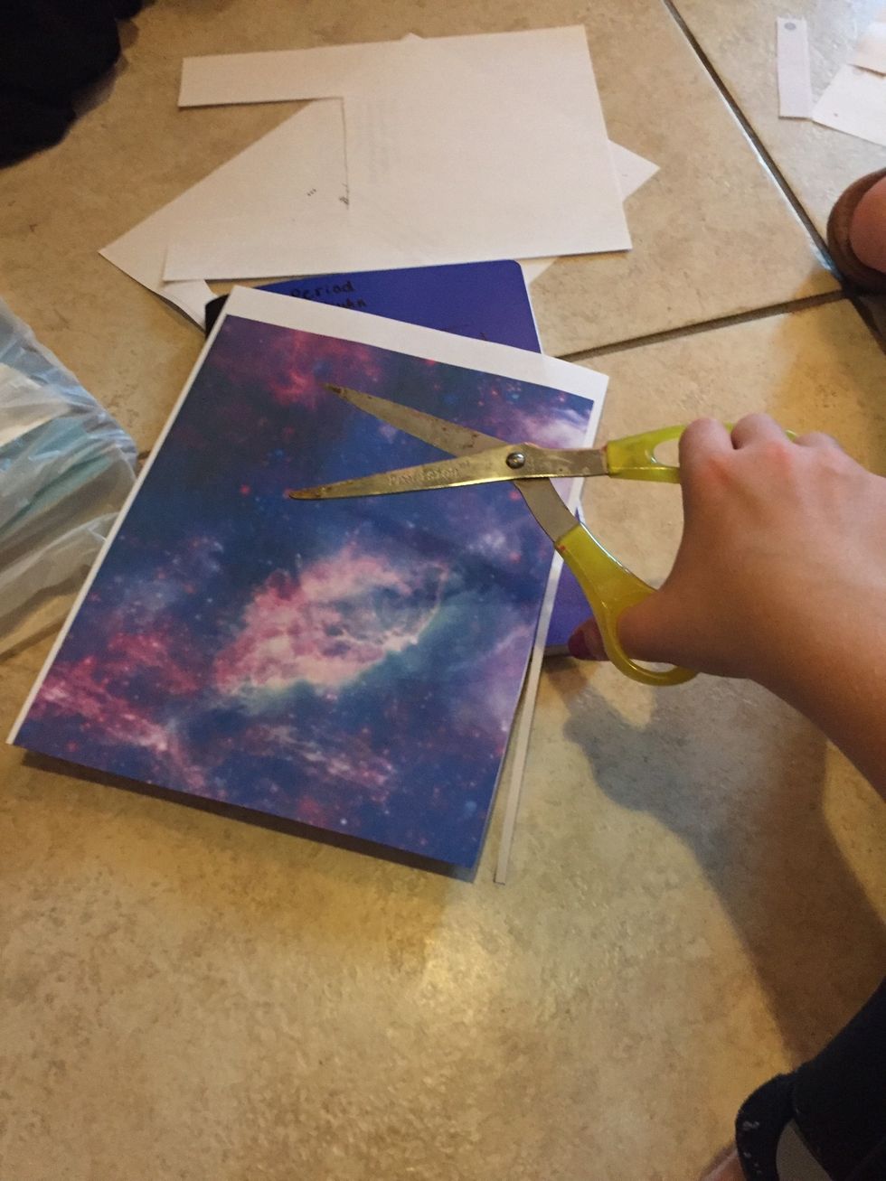 Cut it to the size of the notebook