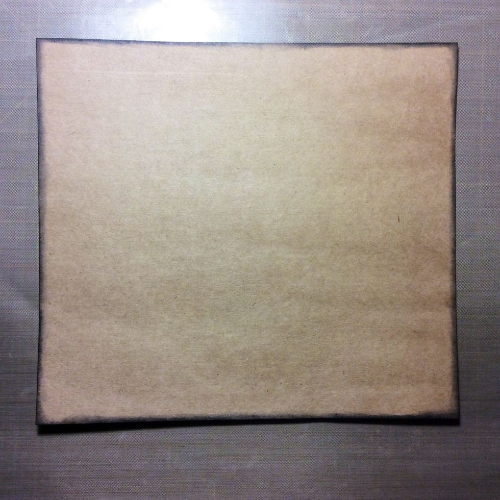 Cut Kraft card stock at 9 3/8 x 8 1/2 inches and ink edges