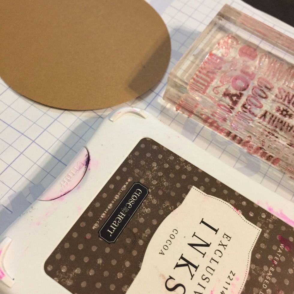 Cut Kraft paper to 3 1/4 inch circles. I used my cricut machine and my close To My Heart Art Philosophy Cartridge to cut them quickly!