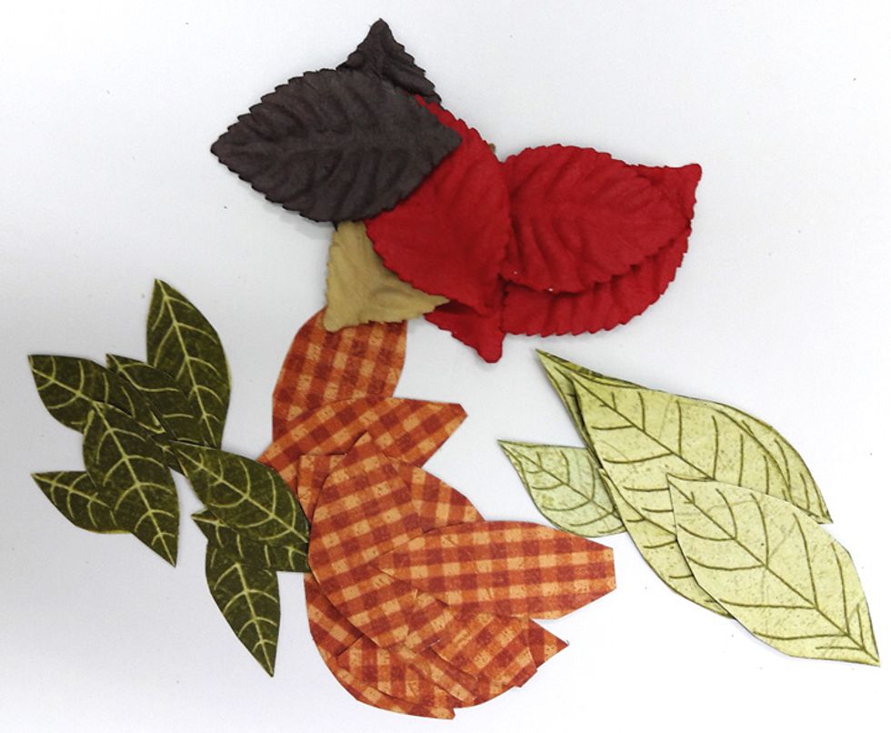 Cut leafs from Botanicabella - Birds in Paradise and Eden's Symphony papers and use paper leaves as well.