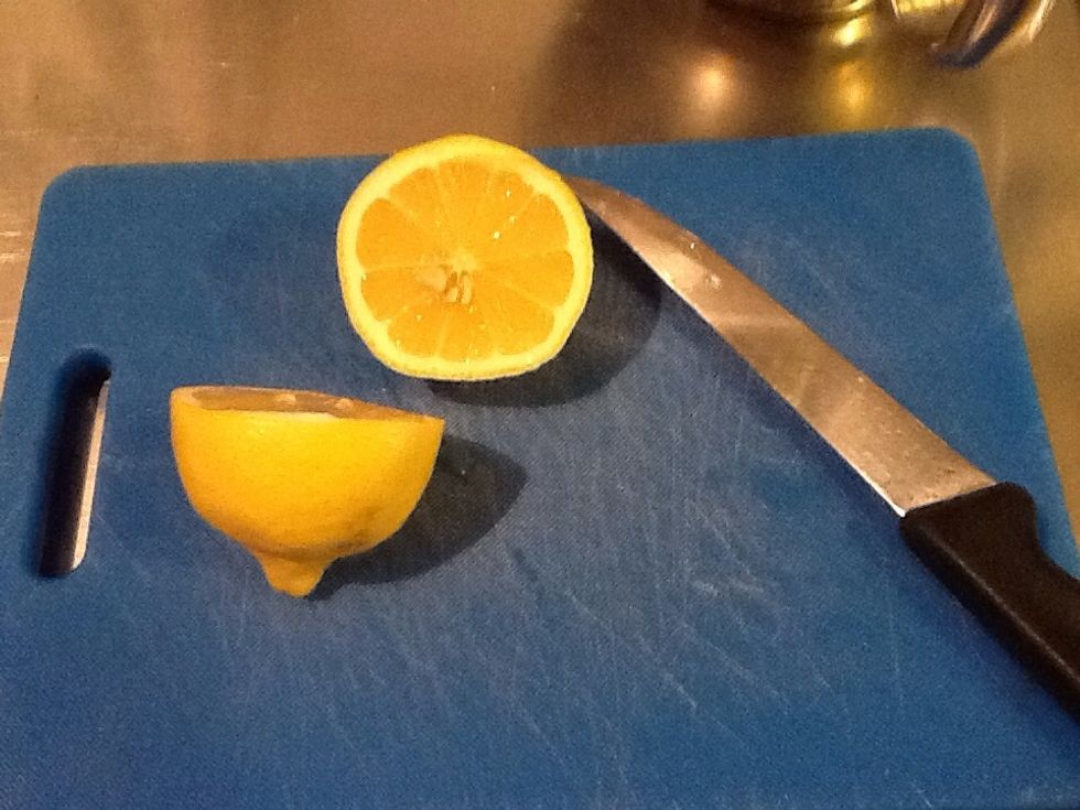 Cut lemon in half. Put the other half in the fridge.