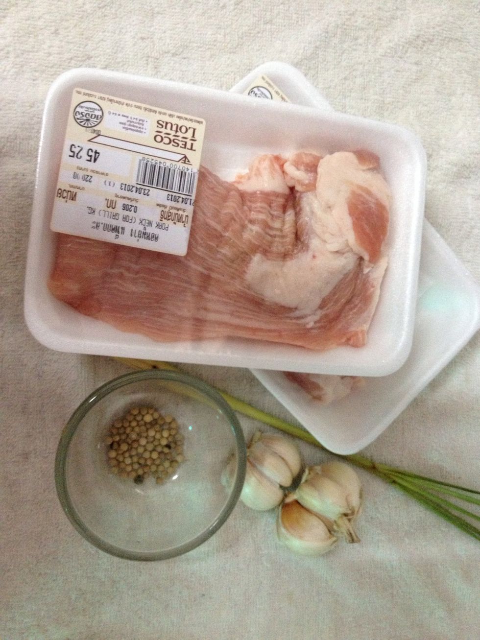 cut lemongrass & garlic into small pieces. then grind all ingredients in a mortar (except pork)