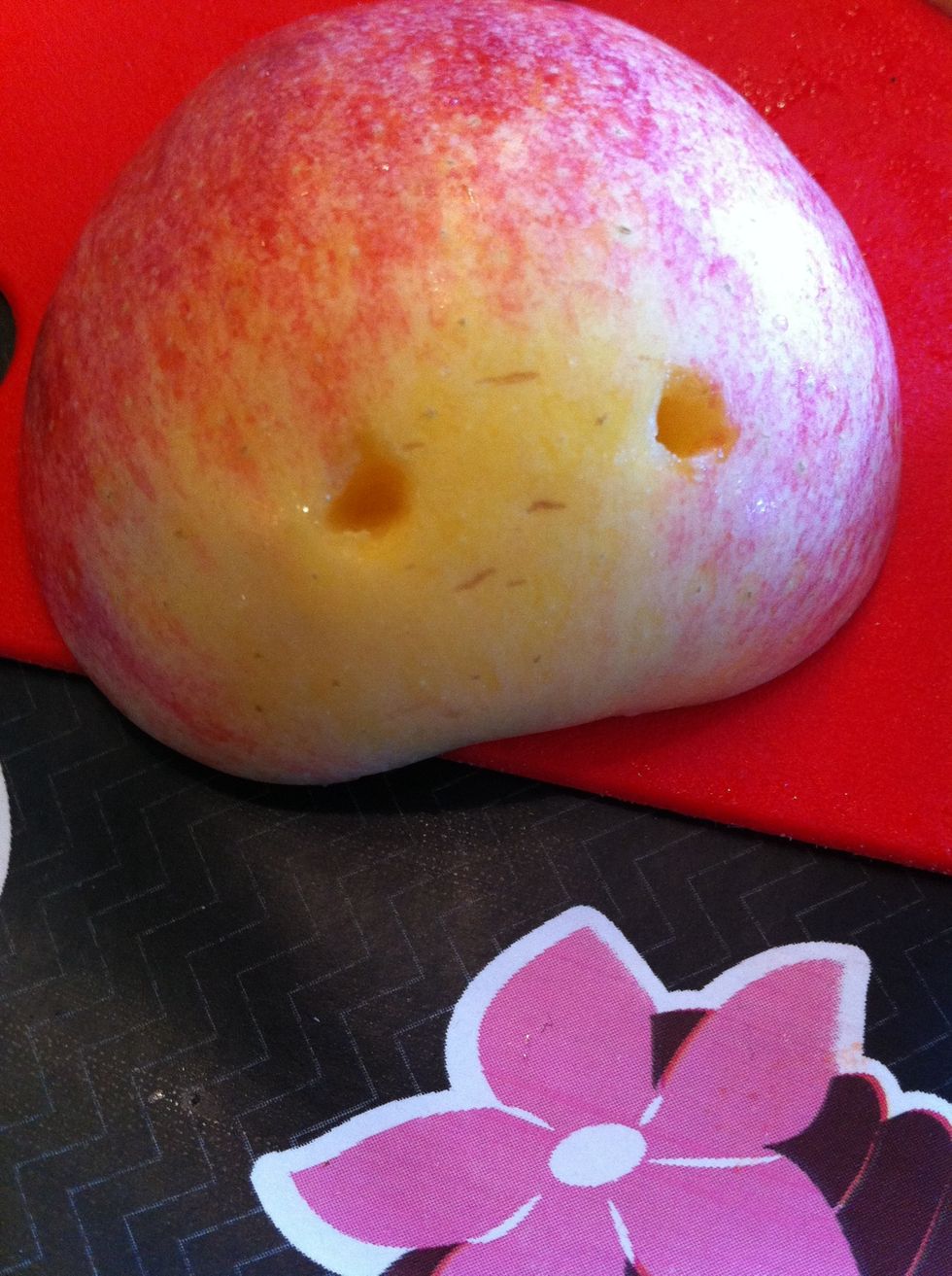 Cut little holes in your third for eyes