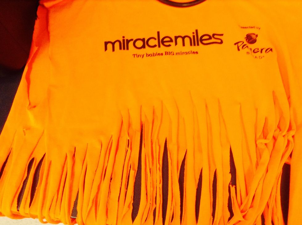 Cut multiple small strips up the shirt.