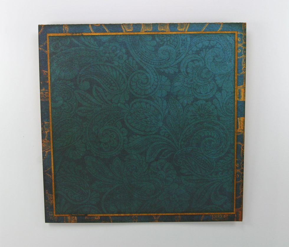 Cut next layer at 4 6/8 x 4 6/8 inches. Ink all side well and attach to center with adhesive tape.