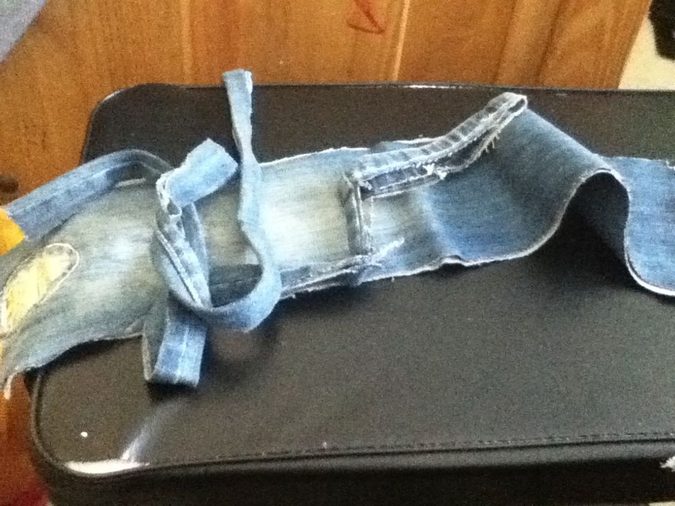 Cut of all the seams off of the jean leg