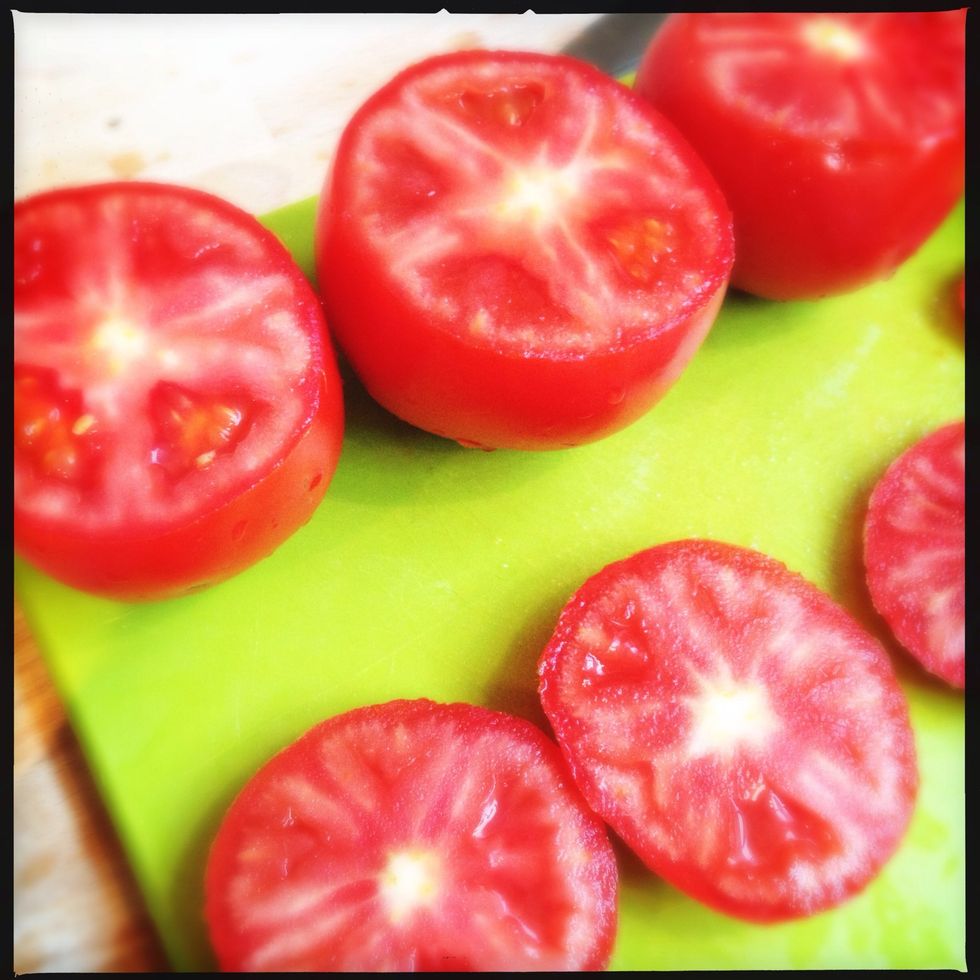 Cut of the caps of your tomatoes.