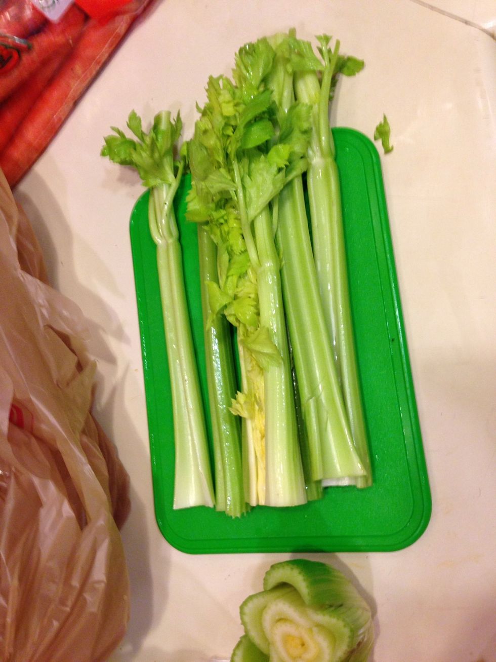 Cut of the ends of the celery and add it to the bottom of the stock pot.