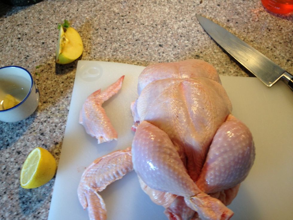 Cut of the wing at the second joint from the tip. Save the wing tips and put them in your pot along with the chicken.