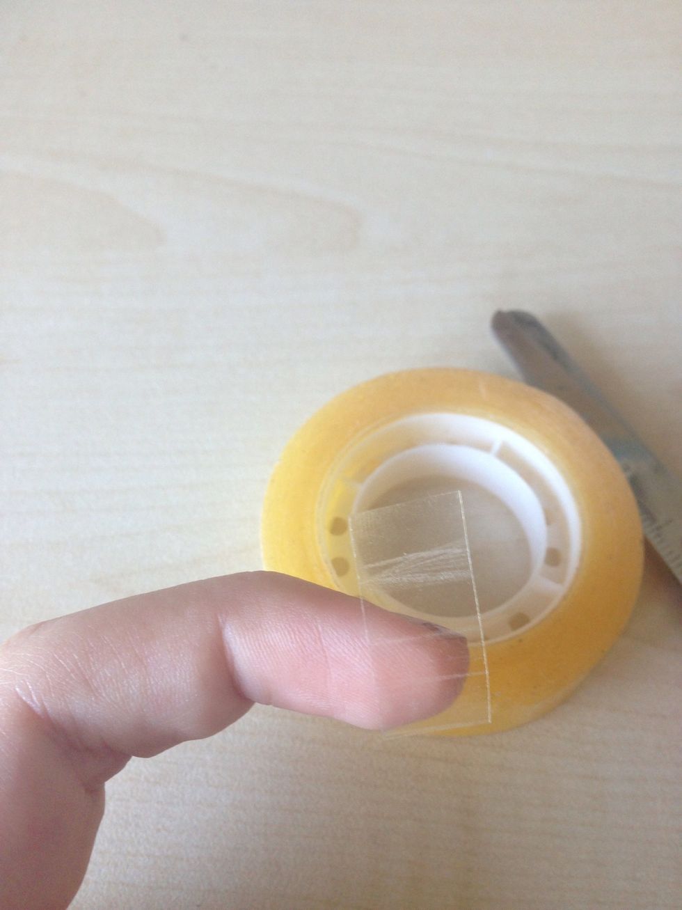 Cut off a piece of tape.