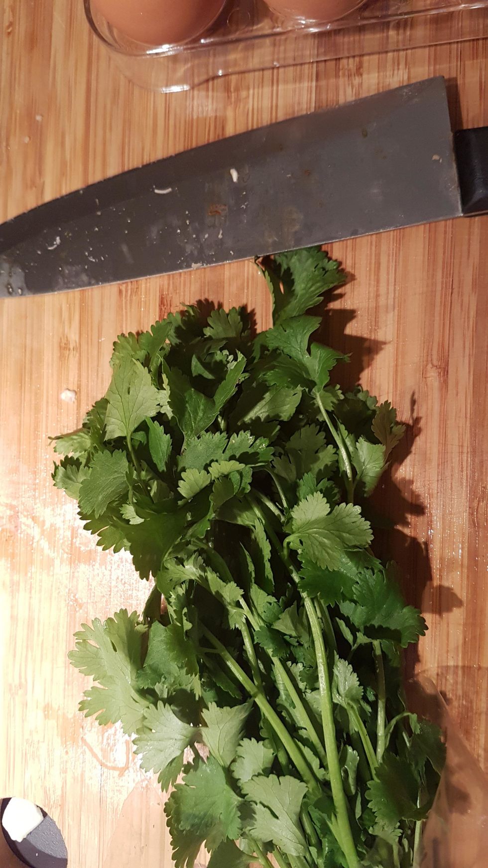 Cut off a third of the coriander to use.