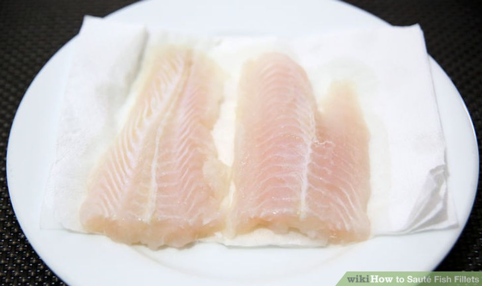 Cut off any dark or red meat (this will taste bad). Then cut your fish into pieces about the size of three of your fingers.