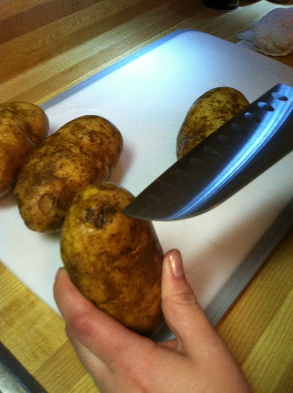 Cut off bad spots but leave skin on potato.  Now we're ready to chop!!