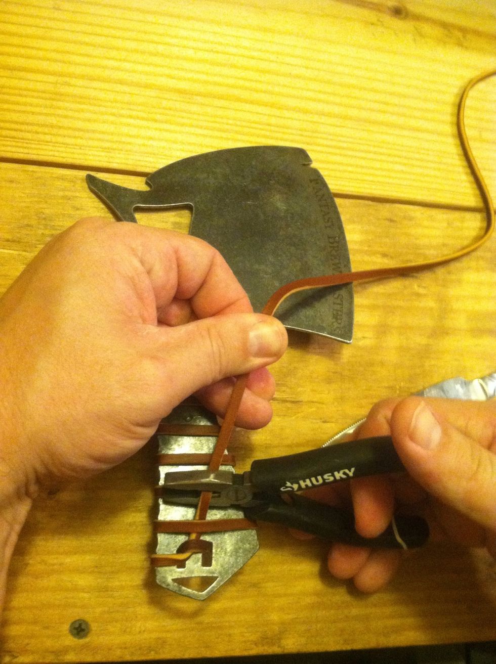 Cut off excess lacing.