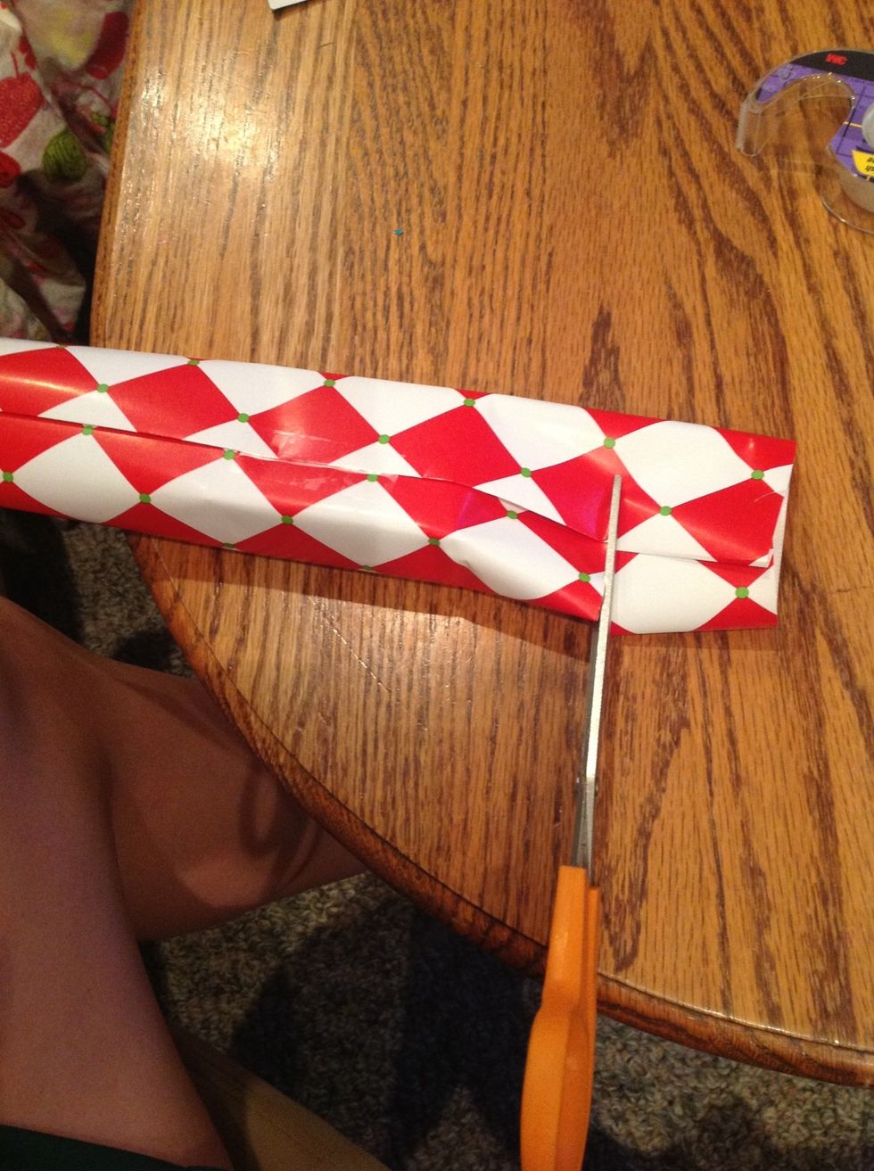 cut off excess pieces from each side of the present (leave enough to finish the ends though)