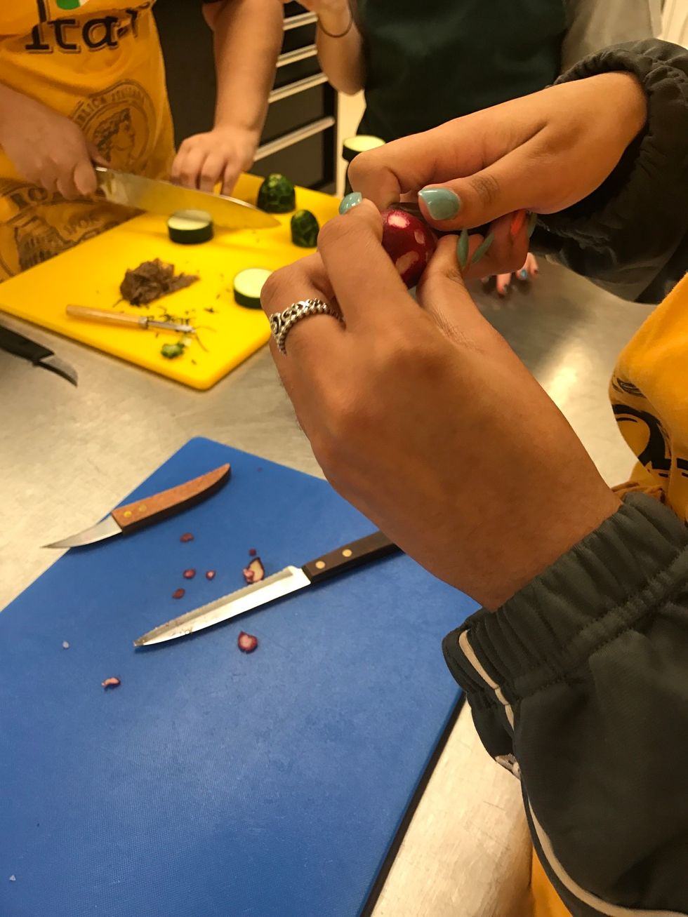 Cut off the bottom half of the radish , don't cut all the way through use the toothpick as a guide to cut around for the stem of the mushroom