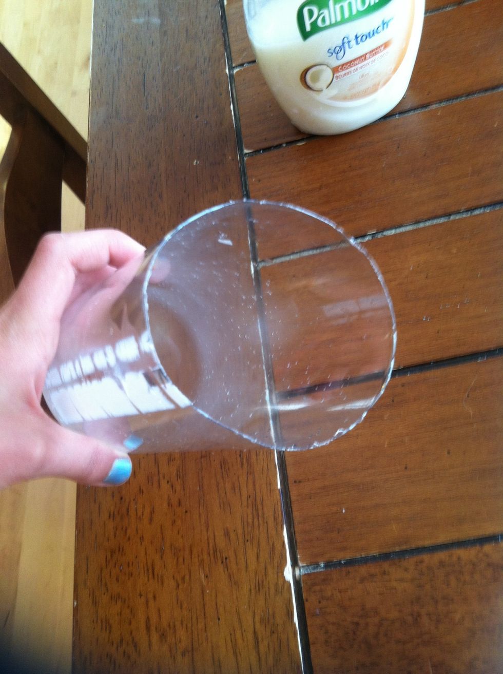 Cut off the bottom of the bottle