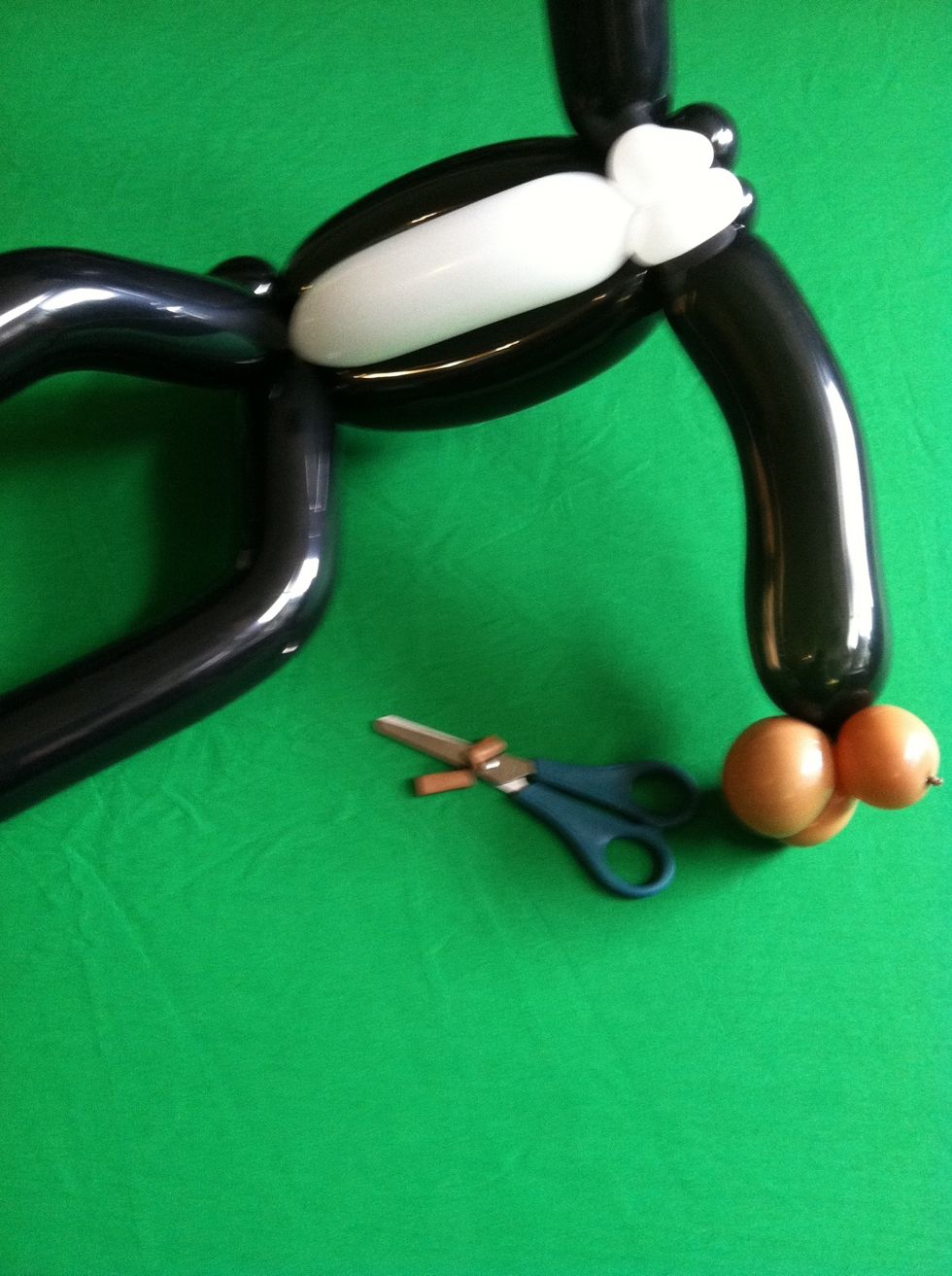 Cut off the extra bits and do the same to the other arm