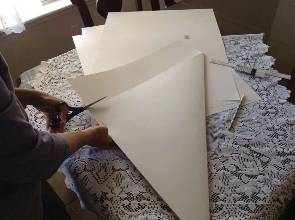 Cut off the poster board excess edge.