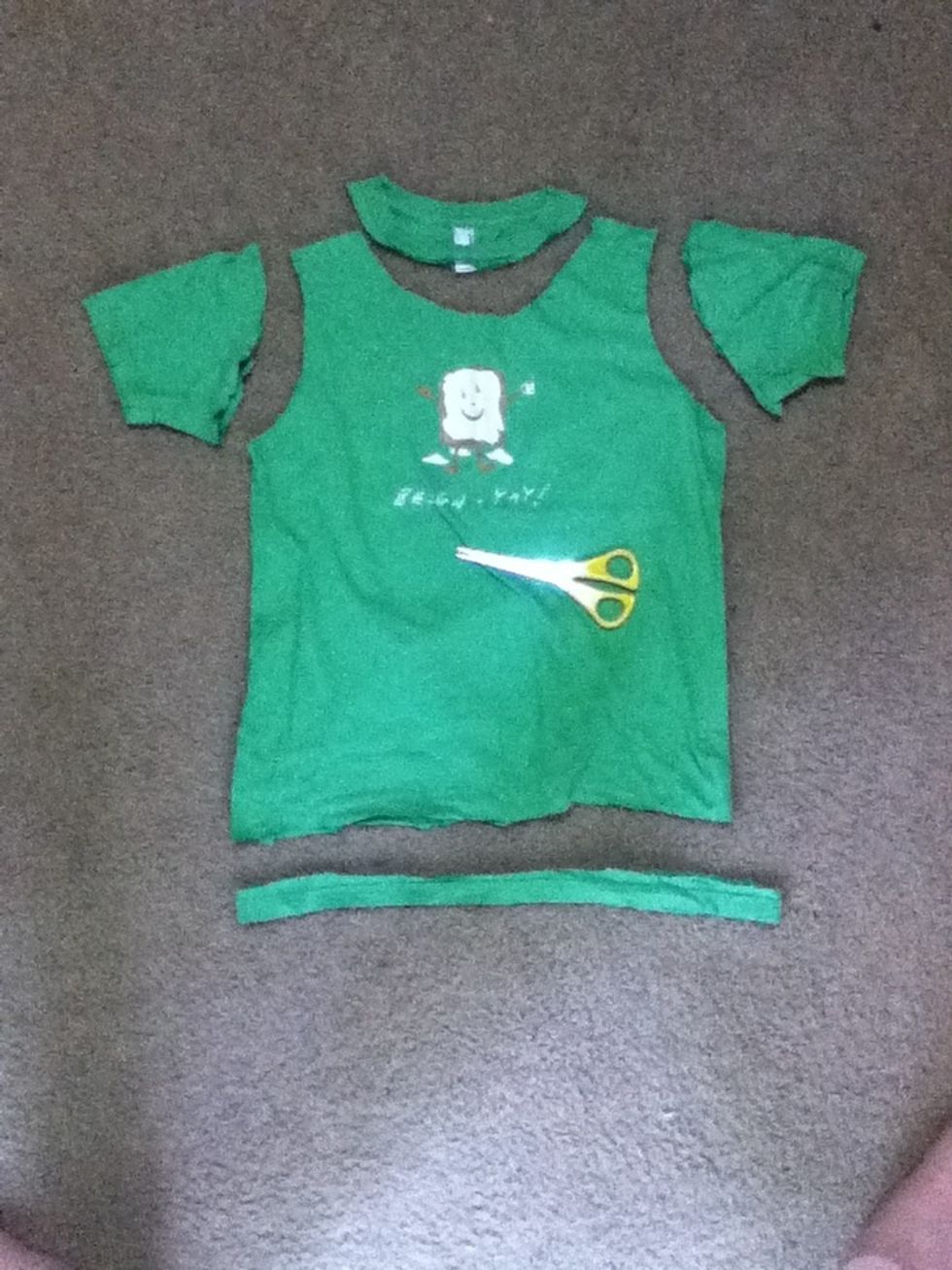Cut off the sleeves, collar, and the bottom hem