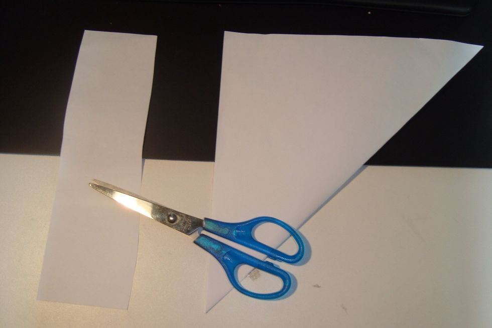 Cut off the tab with your scissors to complete the square.