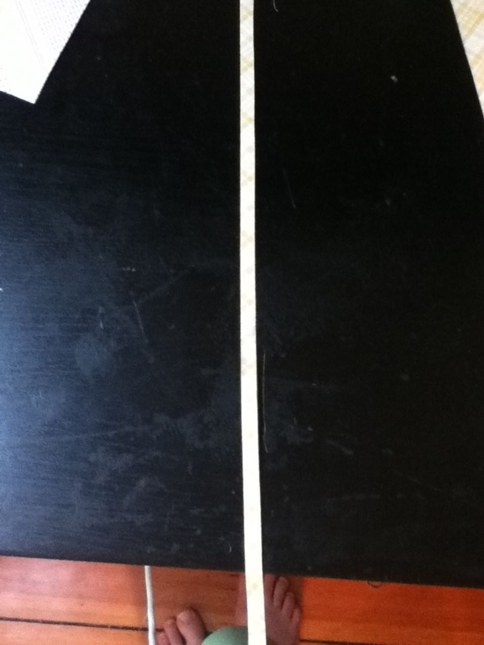 Cut on the line to produce a strip as wide as the measurement.