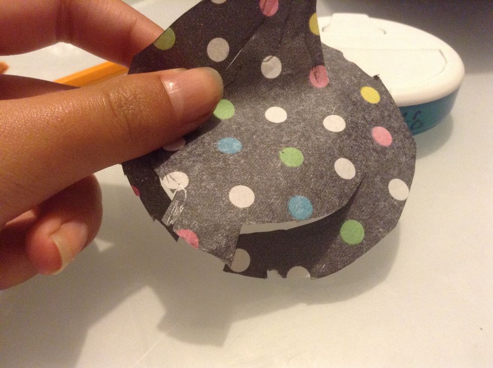 Cut on the lines to create flaps for the openings.