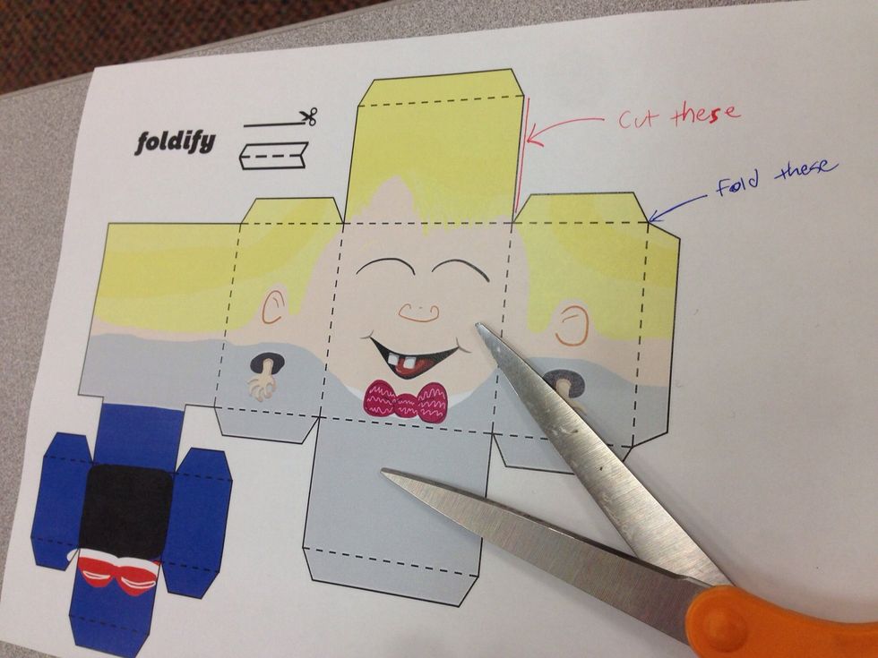 Cut on the solid lines, fold on the dotted lines, then drive yourself crazy taping the whole thing together...