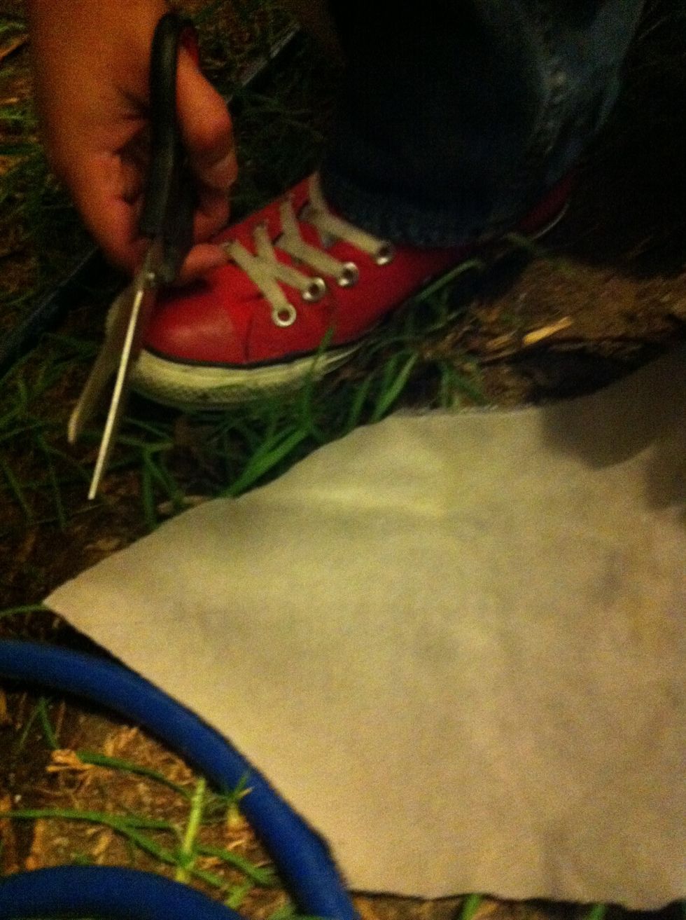 Cut one end into the shape of a triangle.